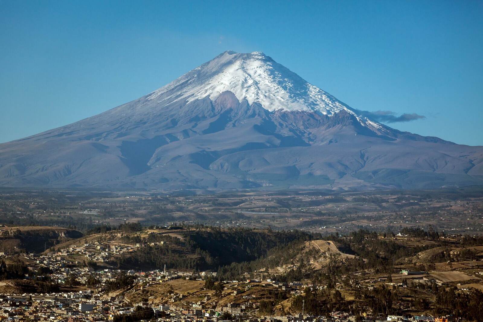Snow-covered Cotopaxi Volcano above the Ecuadorian highlands