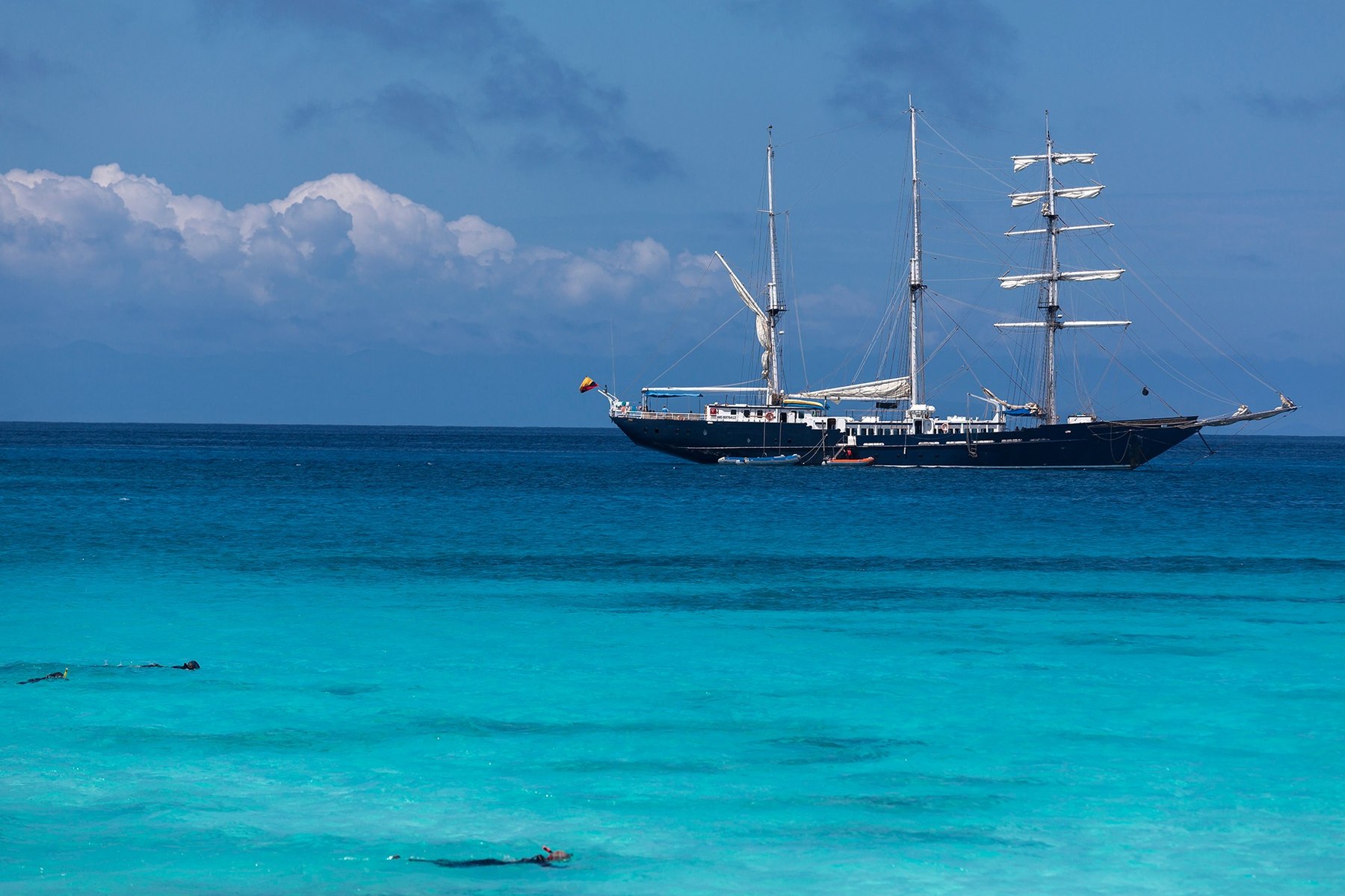 Galapagos expedition sailing vessel in turquoise water